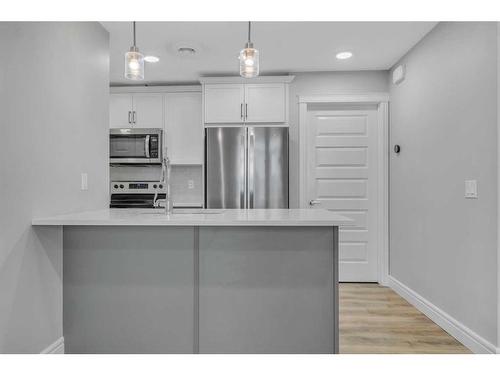 81-230 Seton Passage Se, Calgary, AB - Indoor Photo Showing Kitchen With Stainless Steel Kitchen