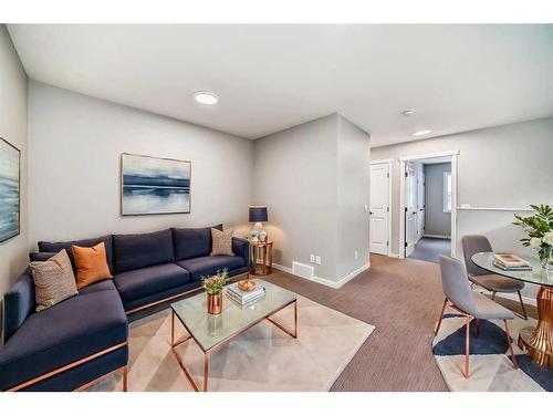 24 Sugarsnap Way Se, Calgary, AB - Indoor Photo Showing Living Room