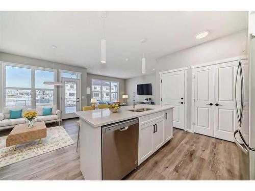 24 Sugarsnap Way Se, Calgary, AB - Indoor Photo Showing Kitchen With Double Sink