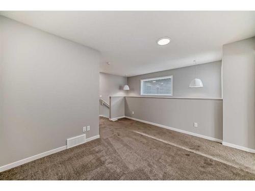 24 Sugarsnap Way Se, Calgary, AB - Indoor Photo Showing Other Room