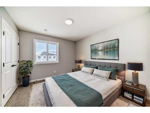 24 Sugarsnap Way Se, Calgary, AB - Indoor Photo Showing Bedroom