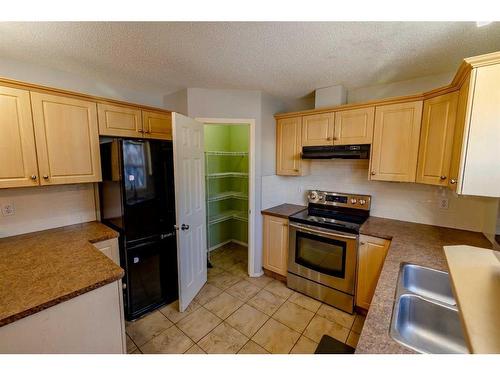 603 Prairie Sound Circle Nw, High River, AB - Indoor Photo Showing Kitchen