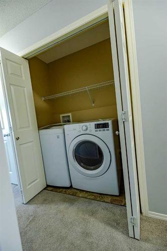 603 Prairie Sound Circle Nw, High River, AB - Indoor Photo Showing Laundry Room