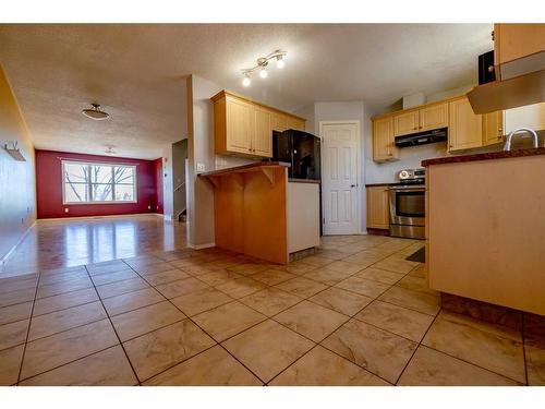 603 Prairie Sound Circle Nw, High River, AB - Indoor Photo Showing Kitchen