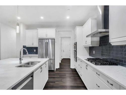 114 Lucas Terrace Nw, Calgary, AB - Indoor Photo Showing Kitchen With Stainless Steel Kitchen With Double Sink With Upgraded Kitchen