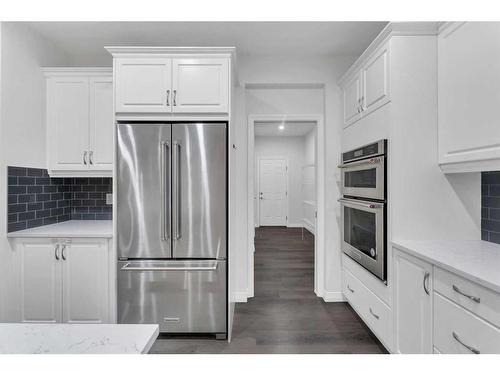 114 Lucas Terrace Nw, Calgary, AB - Indoor Photo Showing Kitchen With Stainless Steel Kitchen