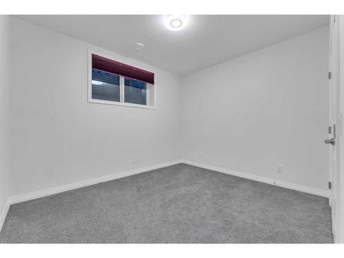 114 Lucas Terrace Nw, Calgary, AB - Indoor Photo Showing Other Room