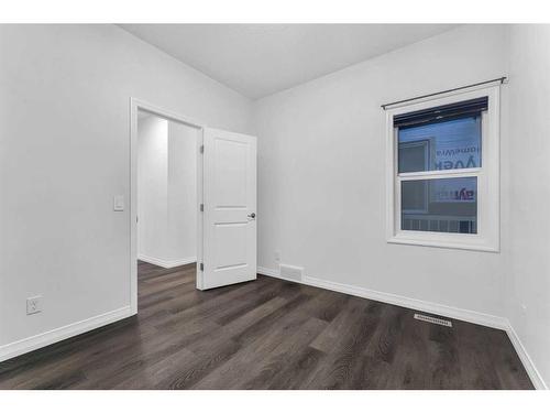 114 Lucas Terrace Nw, Calgary, AB - Indoor Photo Showing Other Room