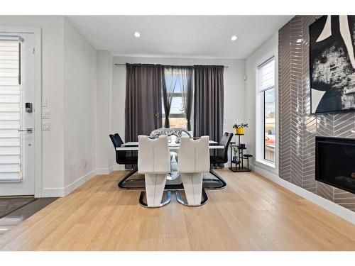 415 6 Street Ne, Calgary, AB - Indoor Photo Showing Dining Room With Fireplace