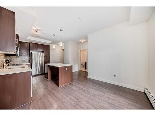 112-15233 1 Street Se, Calgary, AB - Indoor Photo Showing Kitchen