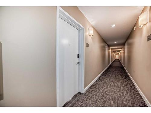 112-15233 1 Street Se, Calgary, AB - Indoor Photo Showing Other Room