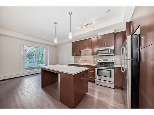 112-15233 1 Street Se, Calgary, AB - Indoor Photo Showing Kitchen