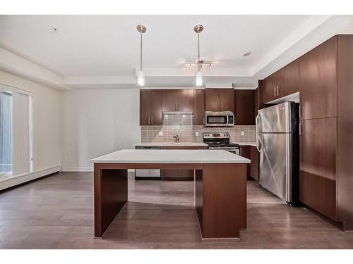 112-15233 1 Street Se, Calgary, AB - Indoor Photo Showing Kitchen