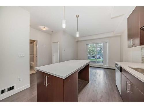 112-15233 1 Street Se, Calgary, AB - Indoor Photo Showing Kitchen