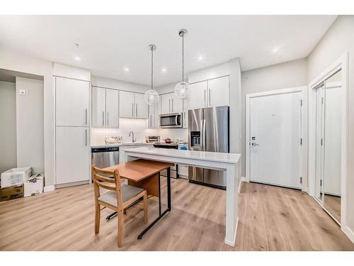 119-383 Smith Street Nw, Calgary, AB - Indoor Photo Showing Kitchen With Stainless Steel Kitchen With Upgraded Kitchen