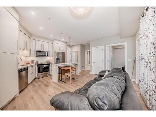 119-383 Smith Street Nw, Calgary, AB - Indoor Photo Showing Kitchen With Stainless Steel Kitchen