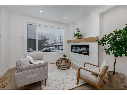 3927 65 Street Nw, Calgary, AB - Indoor Photo Showing Living Room With Fireplace