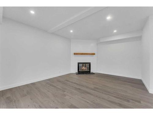 22-5520 1 Avenue Se, Calgary, AB - Indoor With Fireplace