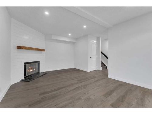 22-5520 1 Avenue Se, Calgary, AB - Indoor With Fireplace