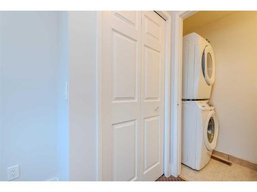 105 Falton Drive Ne, Calgary, AB - Indoor Photo Showing Laundry Room