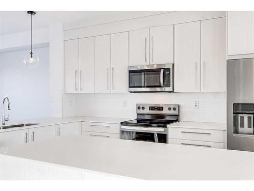 387 Chelsea Parade, Chestermere, AB - Indoor Photo Showing Kitchen With Stainless Steel Kitchen With Upgraded Kitchen