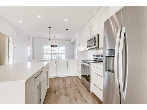 387 Chelsea Parade, Chestermere, AB - Indoor Photo Showing Kitchen With Stainless Steel Kitchen With Upgraded Kitchen