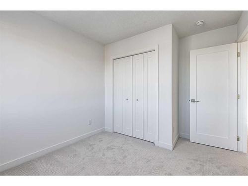 387 Chelsea Parade, Chestermere, AB - Indoor Photo Showing Other Room