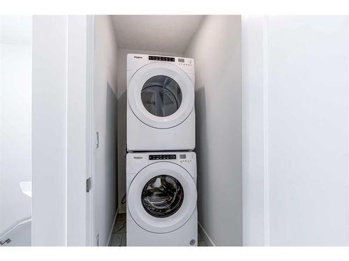 387 Chelsea Parade, Chestermere, AB - Indoor Photo Showing Laundry Room