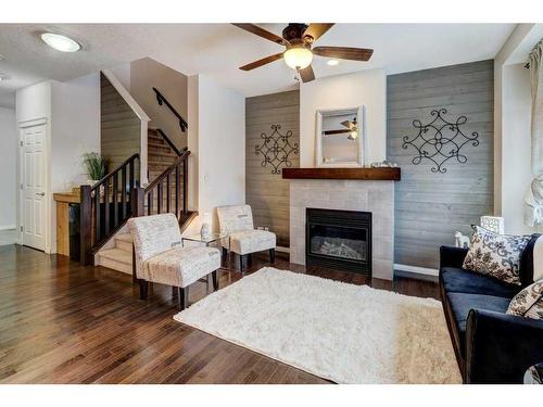 124 Walden Parade Se, Calgary, AB - Indoor Photo Showing Living Room With Fireplace