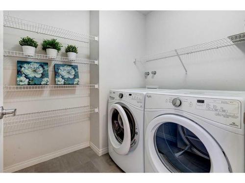 124 Walden Parade Se, Calgary, AB - Indoor Photo Showing Laundry Room