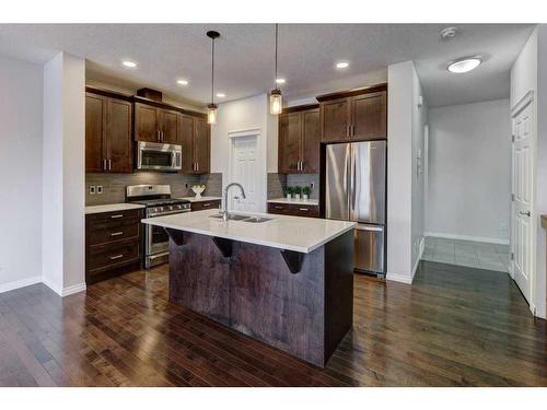 124 Walden Parade Se, Calgary, AB - Indoor Photo Showing Kitchen With Stainless Steel Kitchen With Double Sink With Upgraded Kitchen