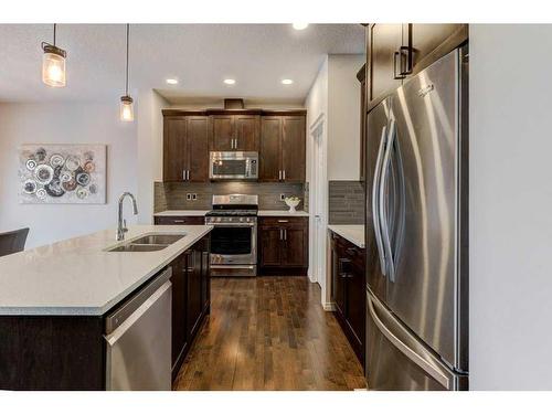 124 Walden Parade Se, Calgary, AB - Indoor Photo Showing Kitchen With Stainless Steel Kitchen With Double Sink With Upgraded Kitchen