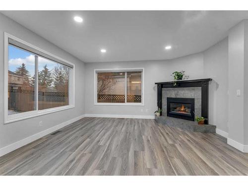 244 Coventry Green Ne, Calgary, AB - Indoor Photo Showing Living Room With Fireplace