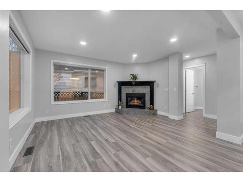 244 Coventry Green Ne, Calgary, AB - Indoor Photo Showing Living Room With Fireplace