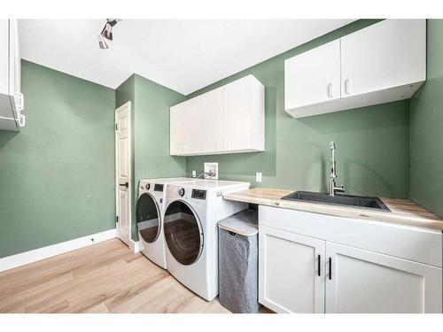 10 Ghost Country Place, Waiparous, AB - Indoor Photo Showing Laundry Room