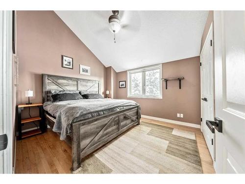 10 Ghost Country Place, Waiparous, AB - Indoor Photo Showing Bedroom