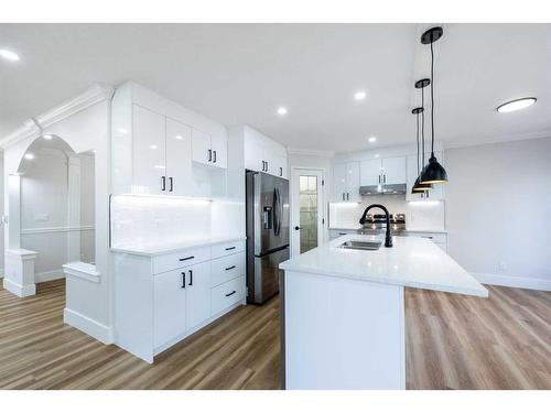 41 Valley Crest Close Nw, Calgary, AB - Indoor Photo Showing Kitchen With Double Sink With Upgraded Kitchen