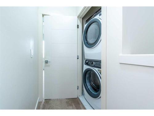 106-116 Saddlestone Heath Ne, Calgary, AB - Indoor Photo Showing Laundry Room