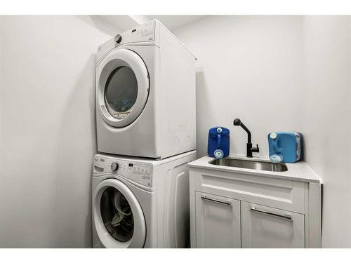 210 Canterbury Place Sw, Calgary, AB - Indoor Photo Showing Laundry Room