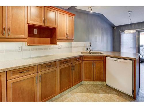 24 Signature Villas Sw, Calgary, AB - Indoor Photo Showing Kitchen With Double Sink