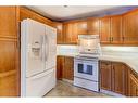 24 Signature Villas Sw, Calgary, AB  - Indoor Photo Showing Kitchen 