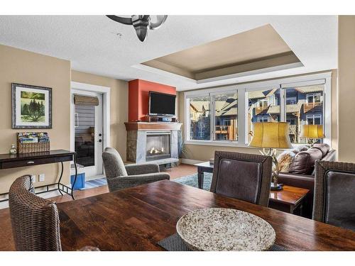 301-173 Kananaskis Way, Canmore, AB - Indoor With Fireplace