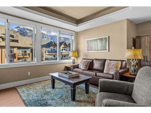 301-173 Kananaskis Way, Canmore, AB - Indoor Photo Showing Living Room