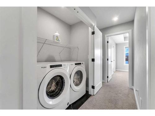 350 Chelsea Hollow, Chestermere, AB - Indoor Photo Showing Laundry Room