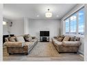 350 Chelsea Hollow, Chestermere, AB  - Indoor Photo Showing Living Room 