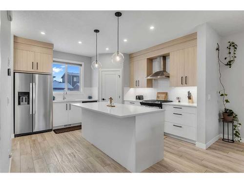 350 Chelsea Hollow, Chestermere, AB - Indoor Photo Showing Kitchen With Upgraded Kitchen