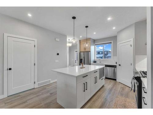 350 Chelsea Hollow, Chestermere, AB - Indoor Photo Showing Kitchen With Upgraded Kitchen