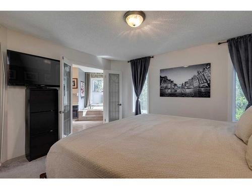 179 Mountain Park Drive Se, Calgary, AB - Indoor Photo Showing Bedroom