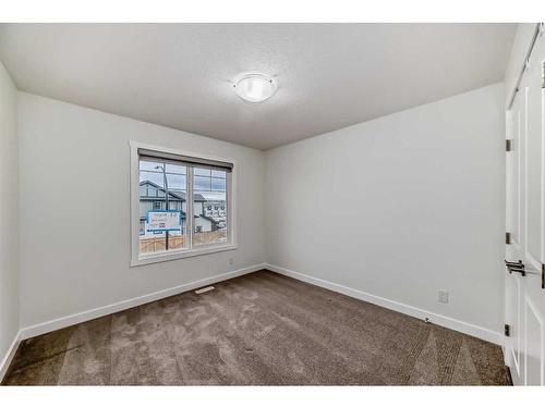 63 Belgian Crescent, Cochrane, AB - Indoor Photo Showing Other Room