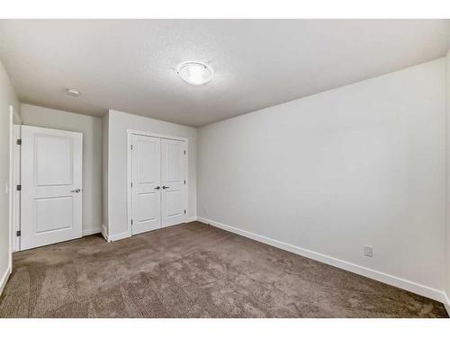 63 Belgian Crescent, Cochrane, AB - Indoor Photo Showing Other Room